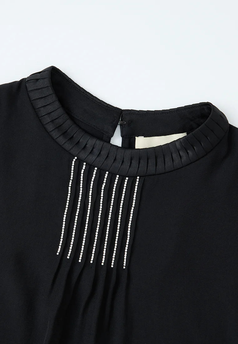 Ruffled crystal trim sleeveless top